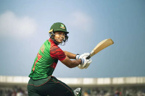 99BA Login — Instantly access your secure account A confident dealer surrounded by casino chips inviting players to access their 99BA account, reflecting quick and easy login options.